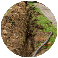 Trench dug out to install stormwater drainage at Sydney home.